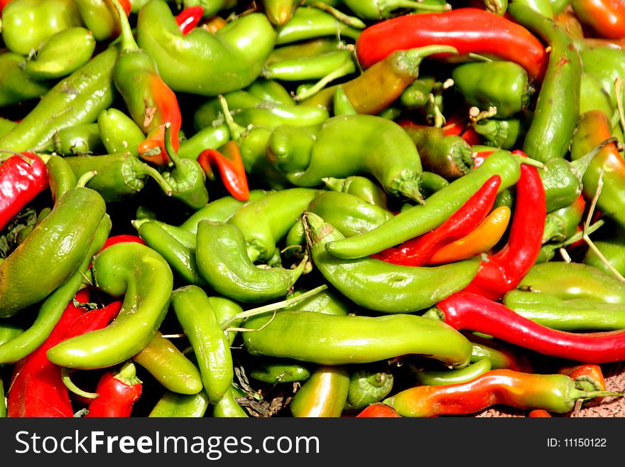 Coloured red and green chili peppers in a market in morocco, africa