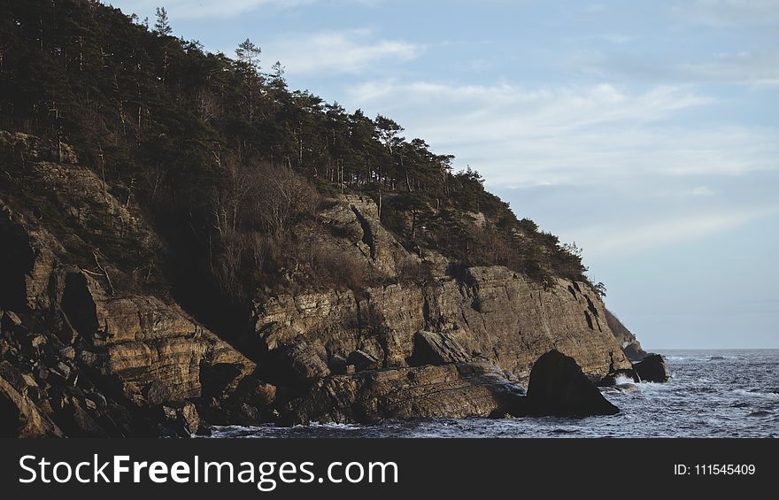 Landscape Photography of Cliff and Ocean