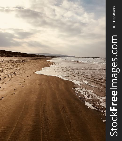 Empty Brown Sand Seashore
