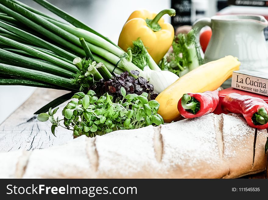 Assorted Vegetable and Bread on Brown Wooden Table