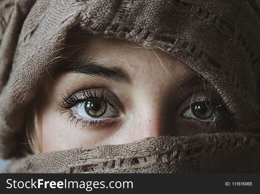 Photo of Person Covered With Brown Textile