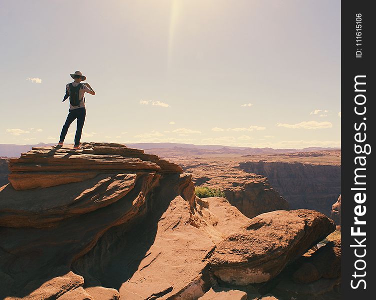 Birds Eye-view of a Man Standing on Grand Canyon