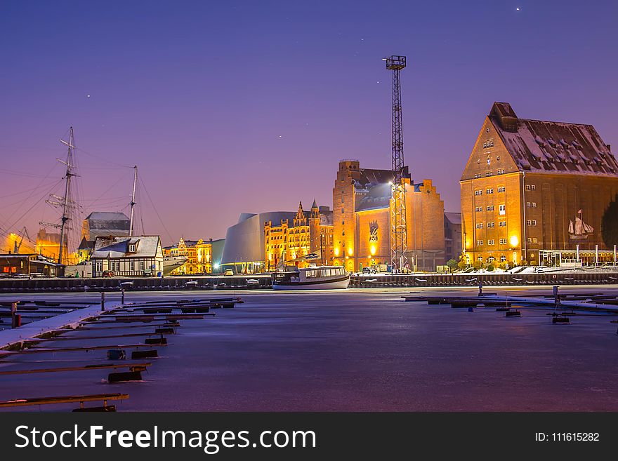 Landscape Photography Of White Buildings During Golden Hour