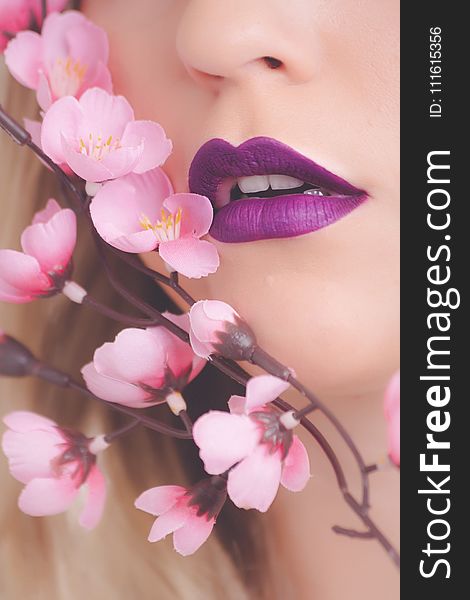 Woman Showing Her Purple Lipstick