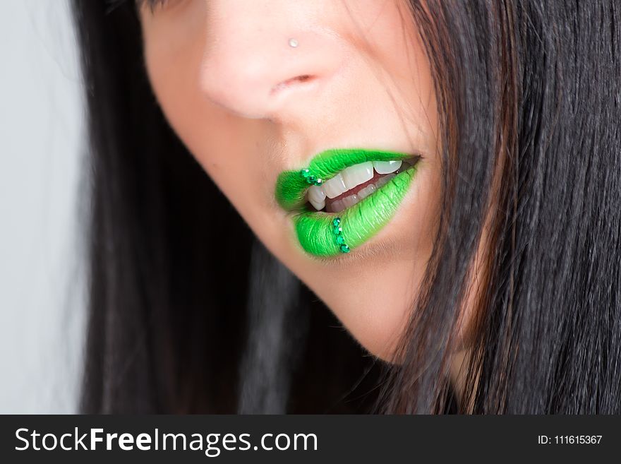 Focus Photography of Woman Wearing Green Lipstick