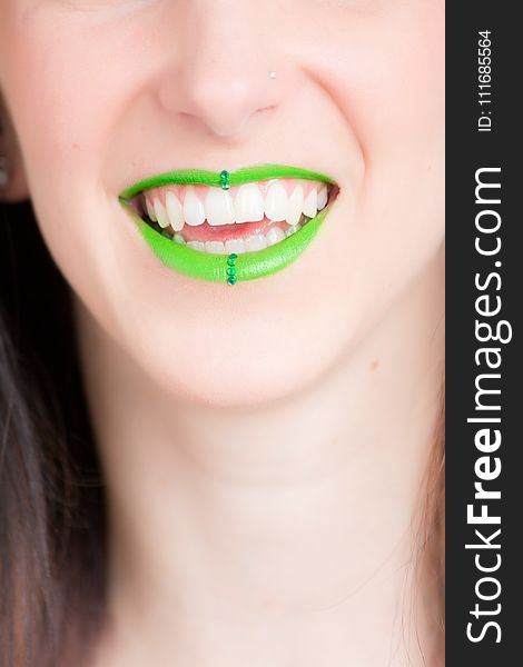 Woman Smiling With Green Lipstick