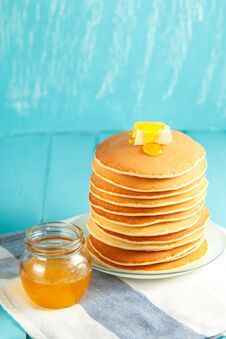 Vertical Photo Of Stack Of Pancake With Honey And Butter Stock Image