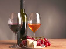 Still Life With Glass And Bottle Of Wine, Cheese And Grapes Royalty Free Stock Image
