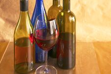 Still Life With Glass And Bottle Of Wine, Cheese And Grapes Stock Image