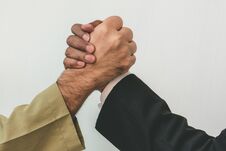 Arab Businessman And Businessman Worker Handshaking Stock Image