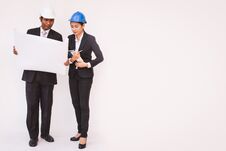 Foreman Architect Man And Woman Working. Teamwork Concept Stock Images