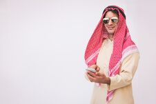 Arab Businessman Useing On A Mobile Phone Stock Photo