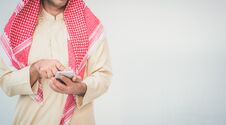 Arab Businessman Useing On A Mobile Phone Royalty Free Stock Photo