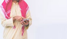 Arab Businessman Useing On A Mobile Phone Royalty Free Stock Photos