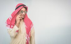 Arab Businessman Useing On A Mobile Phone Royalty Free Stock Photography