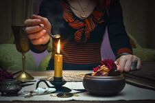 Woman Witch Prepare A Magic Potion. Tarot Cards. Future Reading. Fortune Teller Concept. Royalty Free Stock Photography Woman Witch Prepare A Magic Potion. Tarot Cards. Future Reading. Fortune Teller Concept. Royalty Free Stock Photography