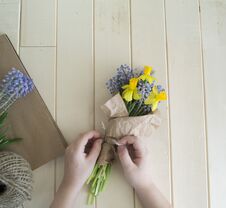 Children`s Hands Collect A Bouquet As A Gift. A Gift For Mom. Royalty Free Stock Image
