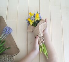 Children`s Hands Collect A Bouquet As A Gift. A Gift For Mom. Royalty Free Stock Photo