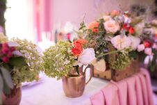 Rustic Flower Arrangement In A Golden Vase At A Wedding Banquet. Table Set For An Event Party Royalty Free Stock Photography Rustic Flower Arrangement In A Golden Vase At A Wedding Banquet. Table Set For An Event Party Royalty Free Stock Photography