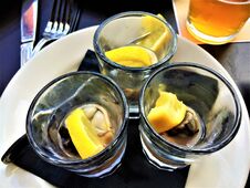 Oyster Shooters With Lemon Royalty Free Stock Photography