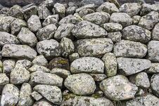 The Stones Lie In A Pile Covered With Moss And Lichen In Close-up. Stock Photos