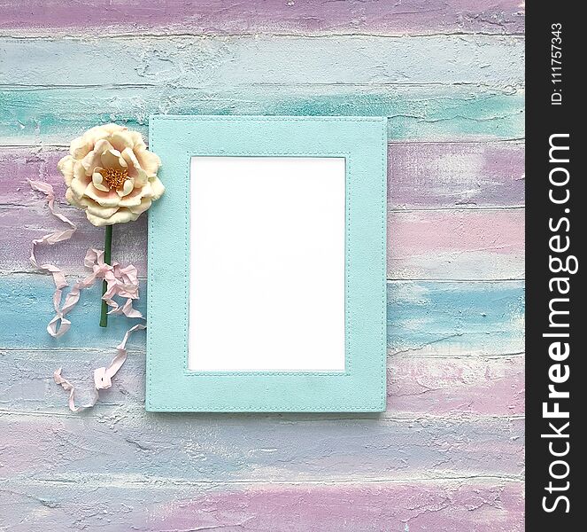 White frame on a wooden background