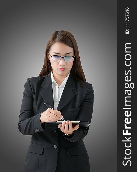 Business woman write on clipboard isolated on Gradient background from white to black with clipping path