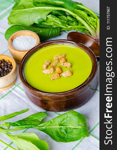 The Spinach Soup Served On Wooden Board