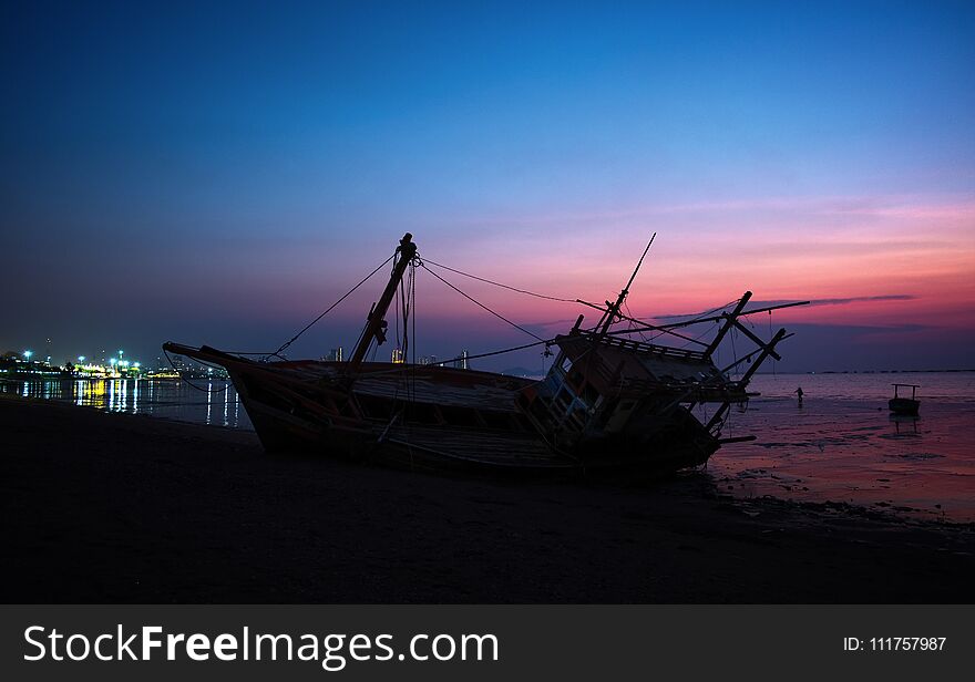 The Wreck was left on the beach with the beautiful twilight sky.