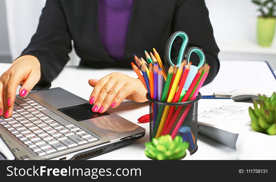 The Woman Behind The Desk In The Office