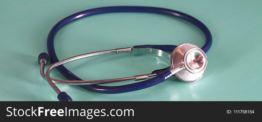 Medical Concept. Top View Of Stethoscope, Clipboard, Pen And Eye Glasses On Blue Background. Flat Lay And Copy Space