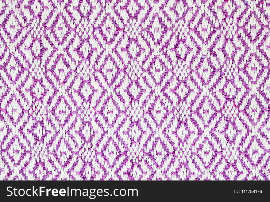 Texture of the fabric surface made of knitted natural cotton fiber, purple-lilac pattern,d