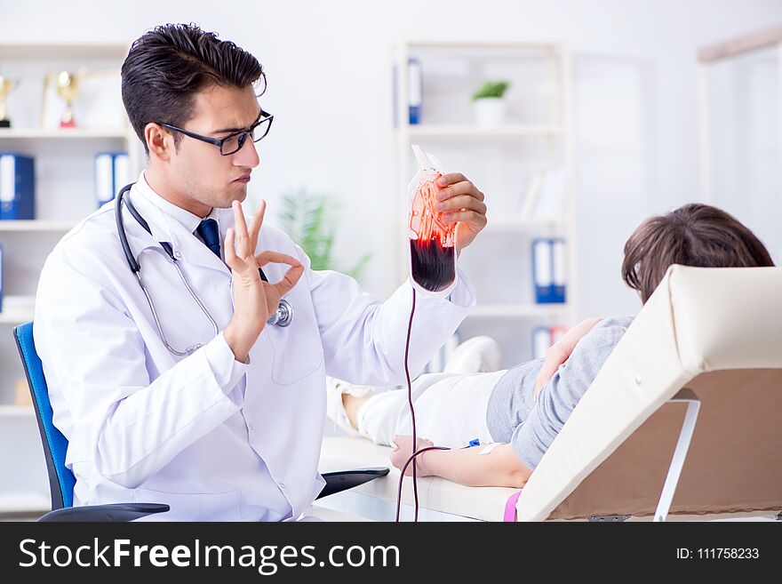 The patient getting blood transfusion in hospital clinic