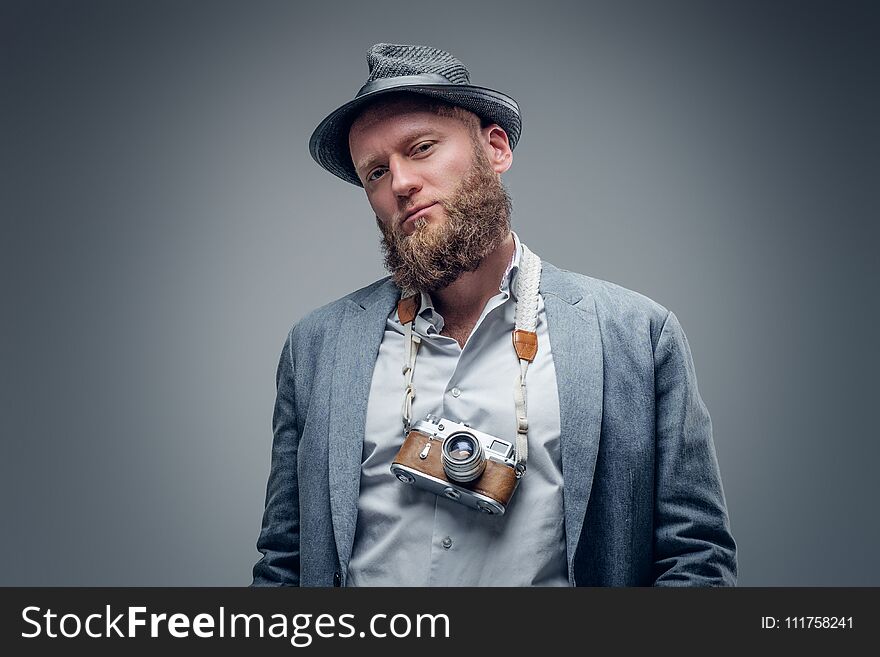 Bearded Male Holds Vintage Slr Photo Camera.