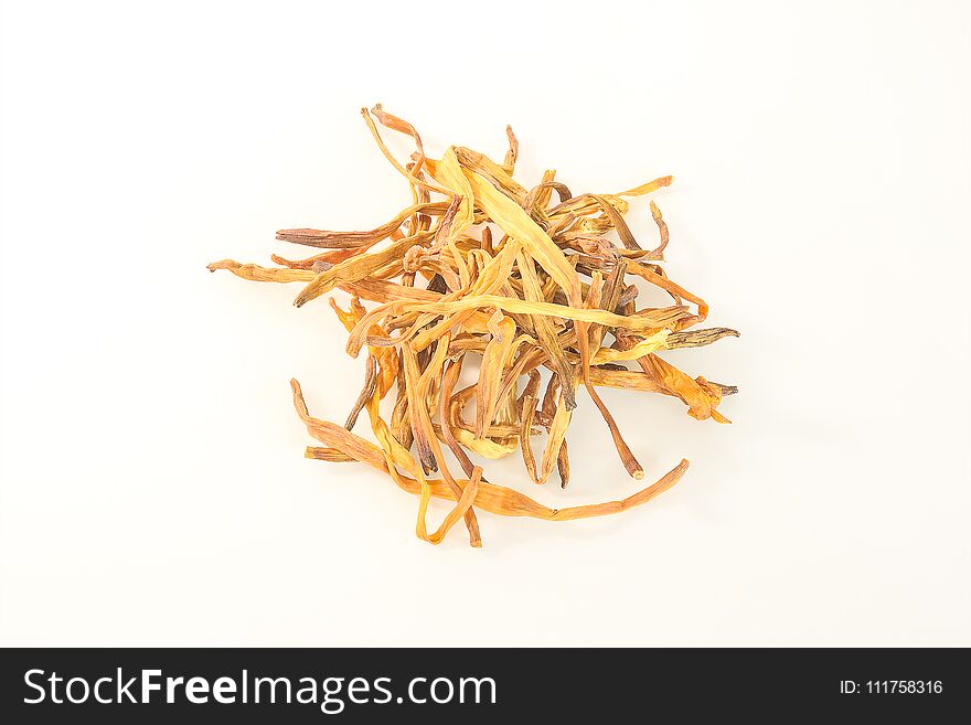 Dried daylily was placed on a white background.
