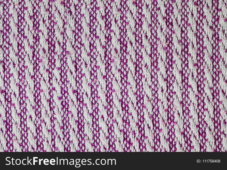 Texture of the fabric surface made of knitted natural cotton fiber, purple-lilac pattern,d