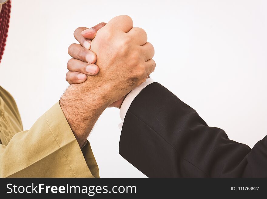 Arab businessman and businessman worker handshaking