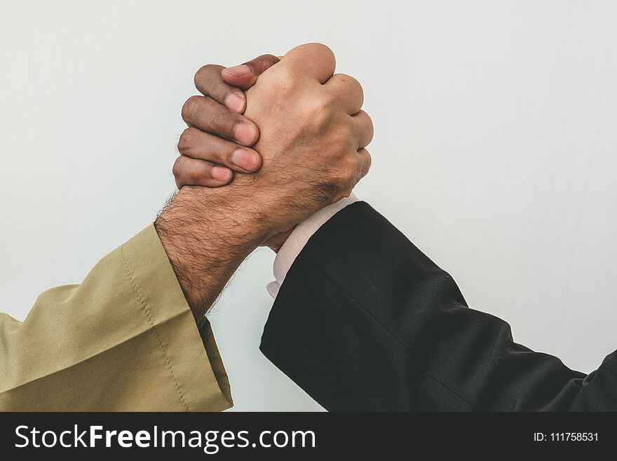 Arab businessman and businessman worker handshaking