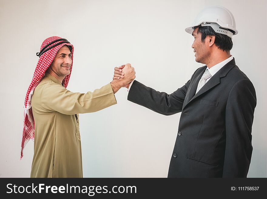 Arab Businessman And Foreman Worker Handshaking