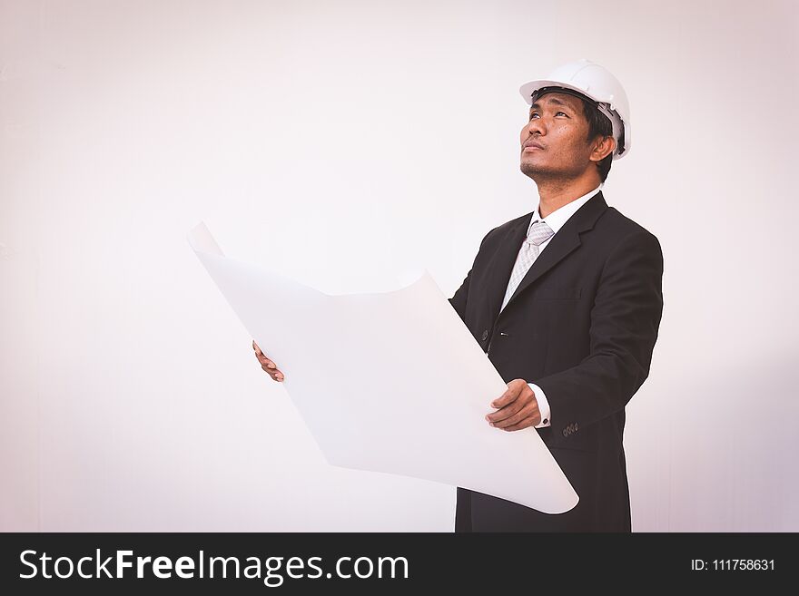 Businessman planning construction project, man