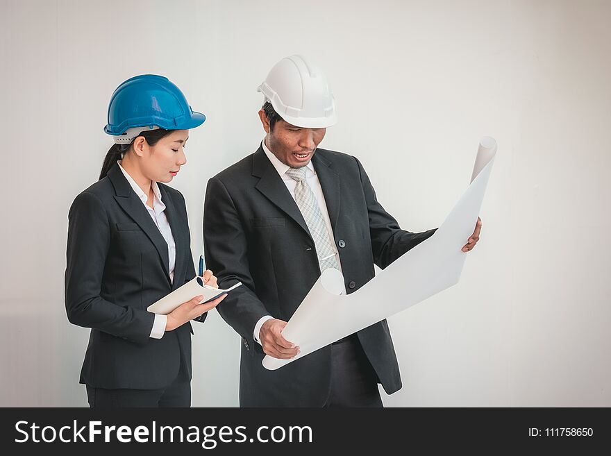 foreman architect man and woman working. teamwork