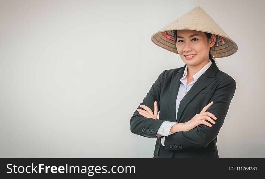 Businesswoman wearing Vietnamese hat