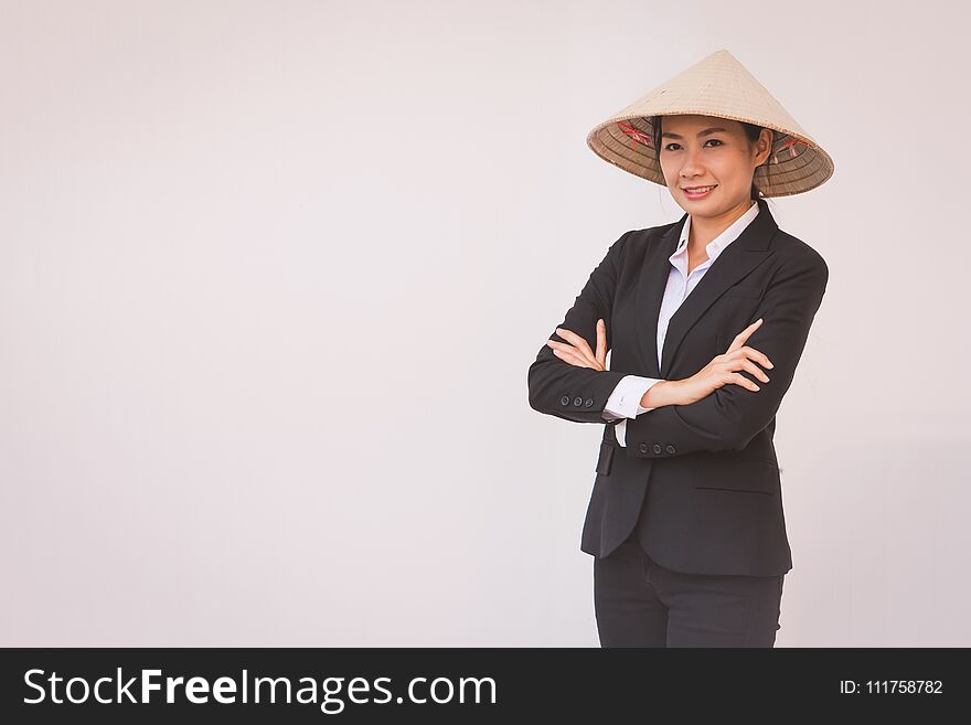 Businesswoman wearing Vietnamese hat
