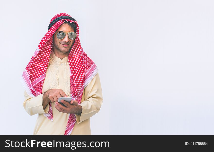 Arab businessman useing on a mobile phone