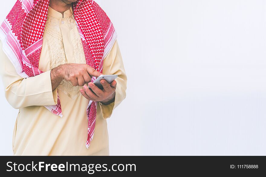 Arab businessman useing on a mobile phone