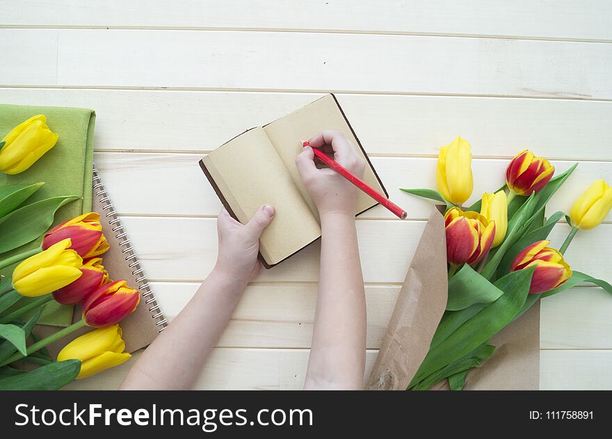 Children`s Hands Write In A Notebook. A Letter To My Mother From The Child.