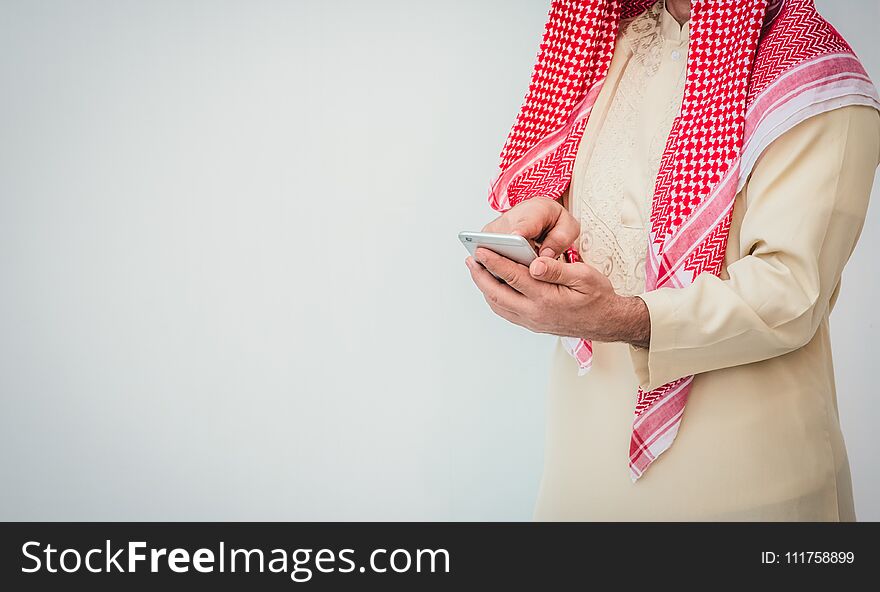 Arab Businessman Useing On A Mobile Phone