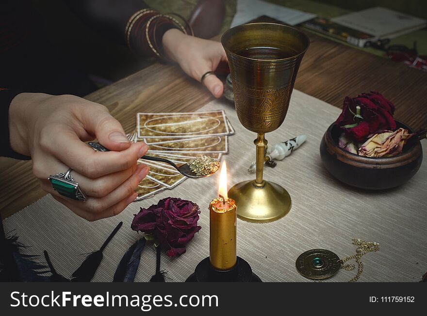 Magic potion. Tarot cards on fortune teller desk table. Future reading. Magic potion. Tarot cards on fortune teller desk table. Future reading.