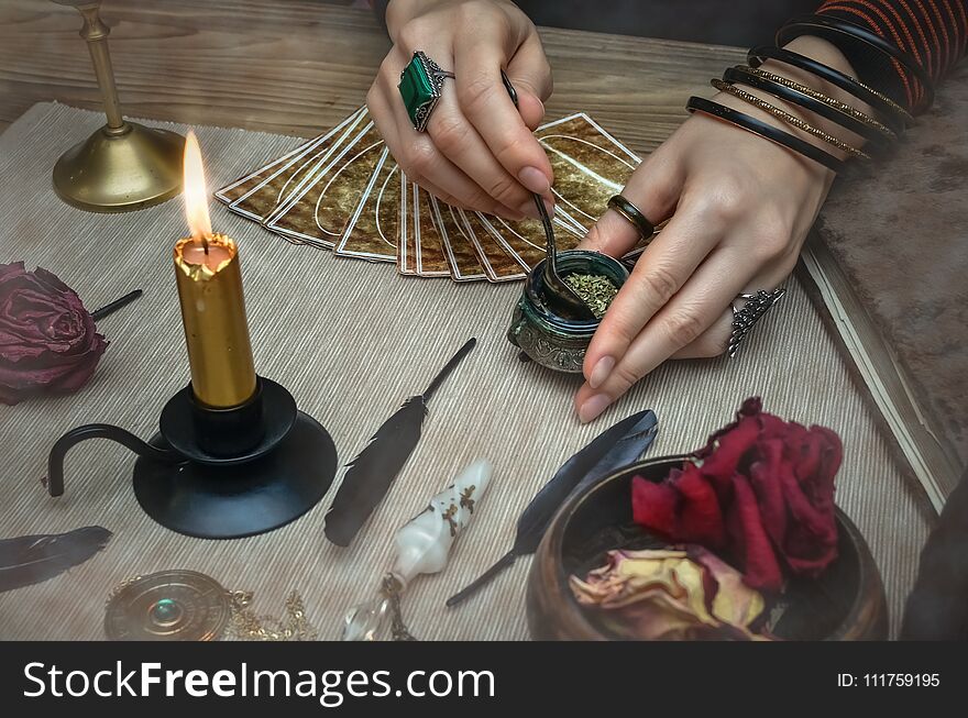 Magic potion. Tarot cards on fortune teller desk table. Future reading. Magic potion. Tarot cards on fortune teller desk table. Future reading.