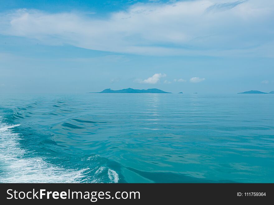 Blue sea with white clouds abstract background pattern. Blue sea with white clouds abstract background pattern